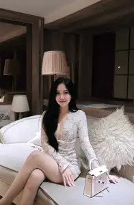 Captivating Beauty: Young Woman in Elegant Lace Dress Shines in Luxurious Restaurant Setting.-4