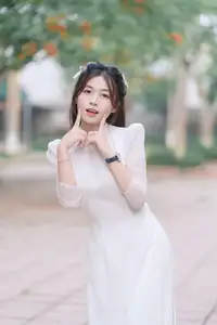 Discover the Elegant Beauty of a Vietnamese Young Woman in White Áo Dài 1000026883-2