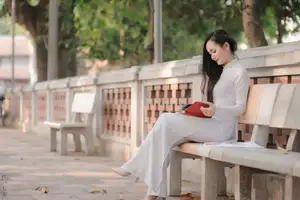 Graceful Vietnamese Girl in White Ao Dai, Radiant Smile at Ancient Site 1000026917-20