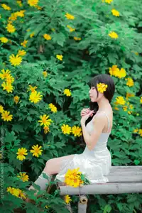 Graceful Young Woman in White Dress Amidst Vibrant Yellow Flowers 1000026997-3
