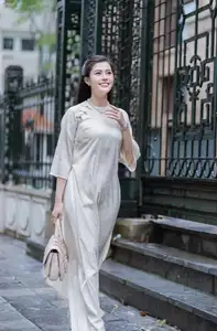 VGU No.162: Modern Ao Dai Grace: Vietnamese Woman's Elegant Style & Allure on City Streets.-5