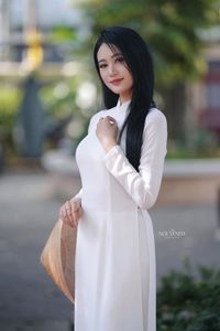 Elegant Vietnamese Girl in Traditional White Ao Dai - Timeless Beauty-6