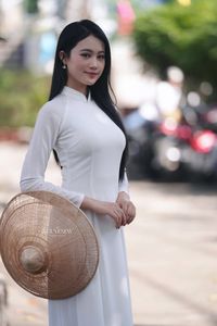 Elegant Vietnamese Girl in Traditional White Ao Dai - Timeless Beauty-21