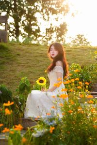 XVG No.2: Serene Beauty A Vietnamese Girl Amidst a Vibrant Flower Garden-0