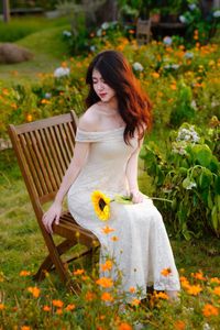 XVG No.2: Serene Beauty A Vietnamese Girl Amidst a Vibrant Flower Garden-4