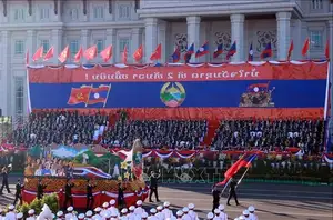 Laos National Day 50th Anniversary: Grand Parade at Vientiane's ThatLuang Captivates All-0