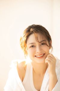 Captivating Female Portrait Bathed in Radiant Morning Sunlight, Embracing Natural Beauty 1000018680-4