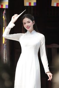 Elegant White Ao Dai: Capturing Graceful Vietnamese Traditional Beauty with a Radiant Smile-8