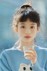 Adorable Girl with Blunt Bangs & Short Hair - Youthful & Charming Style Photo-5