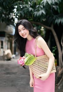 Vietnamese Grace: Elegant Girl in Traditional Flower Market, Discover Vibrant Culture 1000019476-7