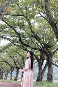 Nature and Girl: Elegant Beauty Amidst a Vibrant Flower Garden-1