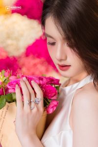 Radiant Vietnamese Girl Amidst a Sea of Vibrant Flowers-1