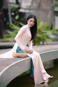Graceful Vietnamese Lady in Traditional Ao Dai  1000024954-25