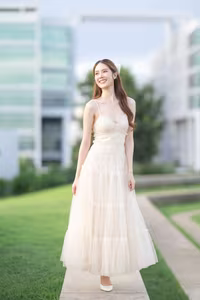 XVG No.19: Radiant Bride: Beautiful Woman in Elegant White Gown with a Joyful Smile in Lush Green Setting.-12