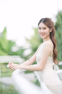 XVG No.19: Radiant Bride: Beautiful Woman in Elegant White Gown with a Joyful Smile in Lush Green Setting.-8
