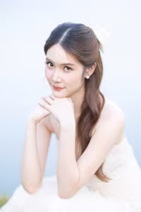 XVG No.19: Radiant Bride: Beautiful Woman in Elegant White Gown with a Joyful Smile in Lush Green Setting.-1