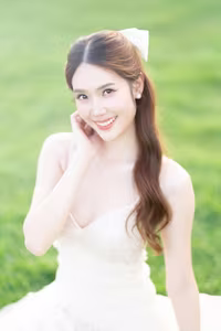 XVG No.19: Radiant Bride: Beautiful Woman in Elegant White Gown with a Joyful Smile in Lush Green Setting.-22