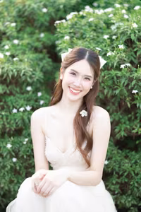 XVG No.19: Radiant Bride: Beautiful Woman in Elegant White Gown with a Joyful Smile in Lush Green Setting.-23