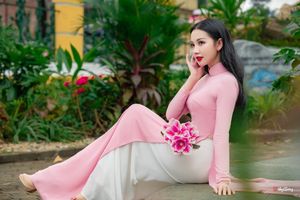 Graceful Vietnamese Woman in Pink Ao Dai: A Stunning Portrayal of Traditional Asian Beauty 1000019457-15