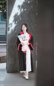 Radiant Student in Graduation Gown Captures Memorable Moment of Success and Joy for a Bright Future.-6