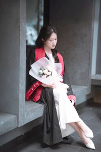 Radiant Student in Graduation Gown Captures Memorable Moment of Success and Joy for a Bright Future.-9