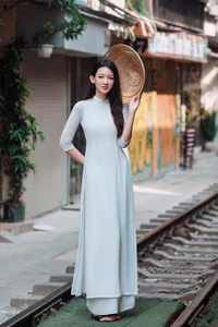 XVG No.52: Elegant Ao Dai Beauty in Hanoi Old Quarter Train Street Captivating Vietnamese Charm-1