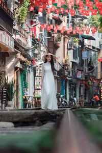 XVG No.52: Elegant Ao Dai Beauty in Hanoi Old Quarter Train Street Captivating Vietnamese Charm-9