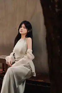 VGU No.170: Elegant Woman in Pristine White Dress Amidst Serene Garden – Capturing Timeless Grace.-0