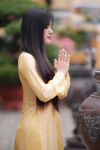VGU No.132: Elegant Yellow Ao Dai Beauty Inspiring Vietnamese Cultural Grace-4