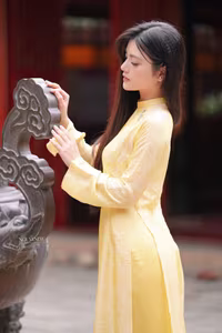 VGU No.132: Elegant Yellow Ao Dai Beauty Inspiring Vietnamese Cultural Grace-1
