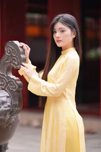 VGU No.132: Elegant Yellow Ao Dai Beauty Inspiring Vietnamese Cultural Grace-11