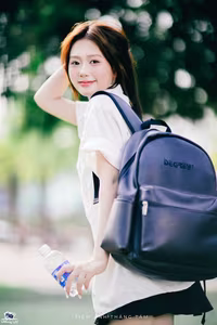 XVG No.36: Young Woman with Camera: Capturing Youthful Charm & Natural Style-12