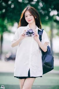 XVG No.36: Young Woman with Camera: Capturing Youthful Charm & Natural Style-1