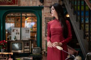 Discover Vietnamese Ao Dai Beauty: Elegant, Graceful Girl in a Cafe Setting-5