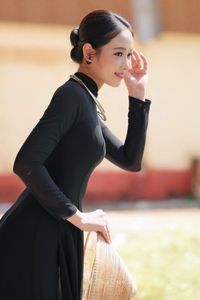 Graceful Vietnamese Woman in Elegant Black Ao Dai-0