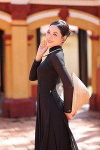 Graceful Vietnamese Woman in Elegant Black Ao Dai-4