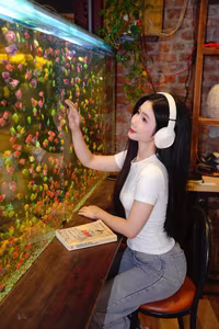 VGU No.124: Girl Reading Relaxing Amidst a Vibrant Aquarium-3