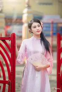 VGU No.163: The Graceful Beauty of a Vietnamese Girl in Traditional Pink Ao Dai Amidst Ancient Architecture-6