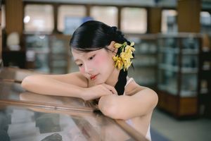 Captivating Asian Beauty: Elegant Young Woman with Braided Hair and Dreamy Gaze - 1000019730-3