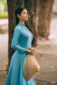 Graceful Vietnamese Woman in Blue Ao Dai Elegant Traditional Beauty-1