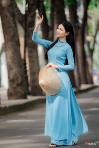 Graceful Vietnamese Woman in Blue Ao Dai Elegant Traditional Beauty-6