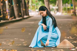 Graceful Vietnamese Woman in Blue Ao Dai Elegant Traditional Beauty-5