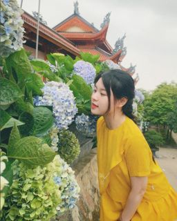 Serene Moments with Hydrangeas: A Young Woman's Nature Portrait-3