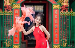 Vietnamese Cultural Beauty: Girl in Red Ao Dai & Traditional Lion Dance Prop-12