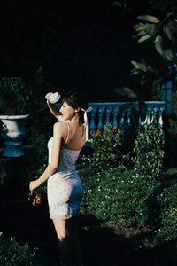 Beautiful Woman Enjoying Fresh Summer Peaches in a Lush Garden Setting, Healthy Lifestyle Inspiration.-4