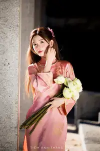 Captivating Serenity: Vietnamese Girl in Pink Ao Dai with Lotus Flowers1730591-13