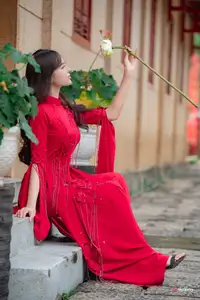 VGU No.188: Captivating Elegance: Vietnamese Beauty in Red Áo Dài with Sacred Lotus Flower.-6