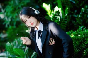 Discover the captivating smile of an Asian girl amidst vibrant nature-0