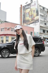 Miss Thanh Thuy's Dynamic Gen Z Style in Thailand: Chic Polo Dress Street Style-7