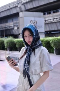 Miss Thanh Thuy's Dynamic Gen Z Style in Thailand: Chic Polo Dress Street Style-1